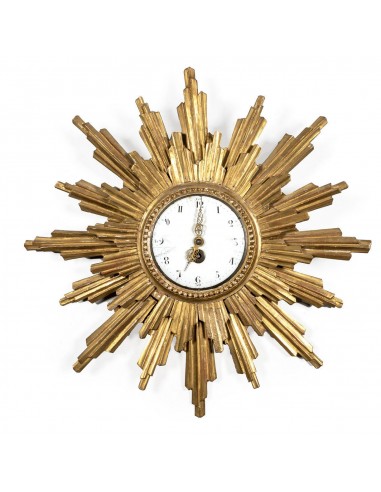 Soleil horloge en bois doré et sculpté